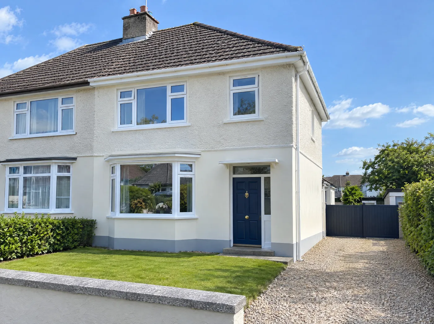 Freshly painted rendered front of a Dublin semi-detached house