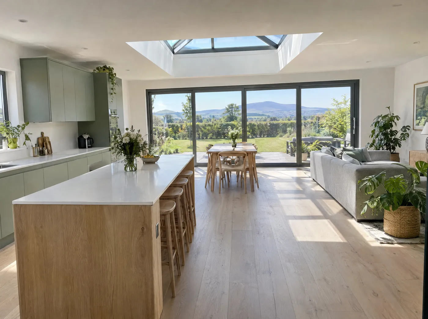 Open-plan kitchen and living room in a flat roof extension behind an Irish bungalow
